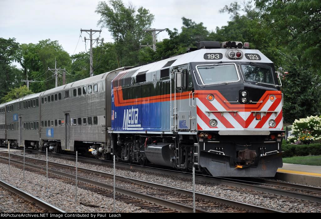 Commuter makes its station stop before shoving east